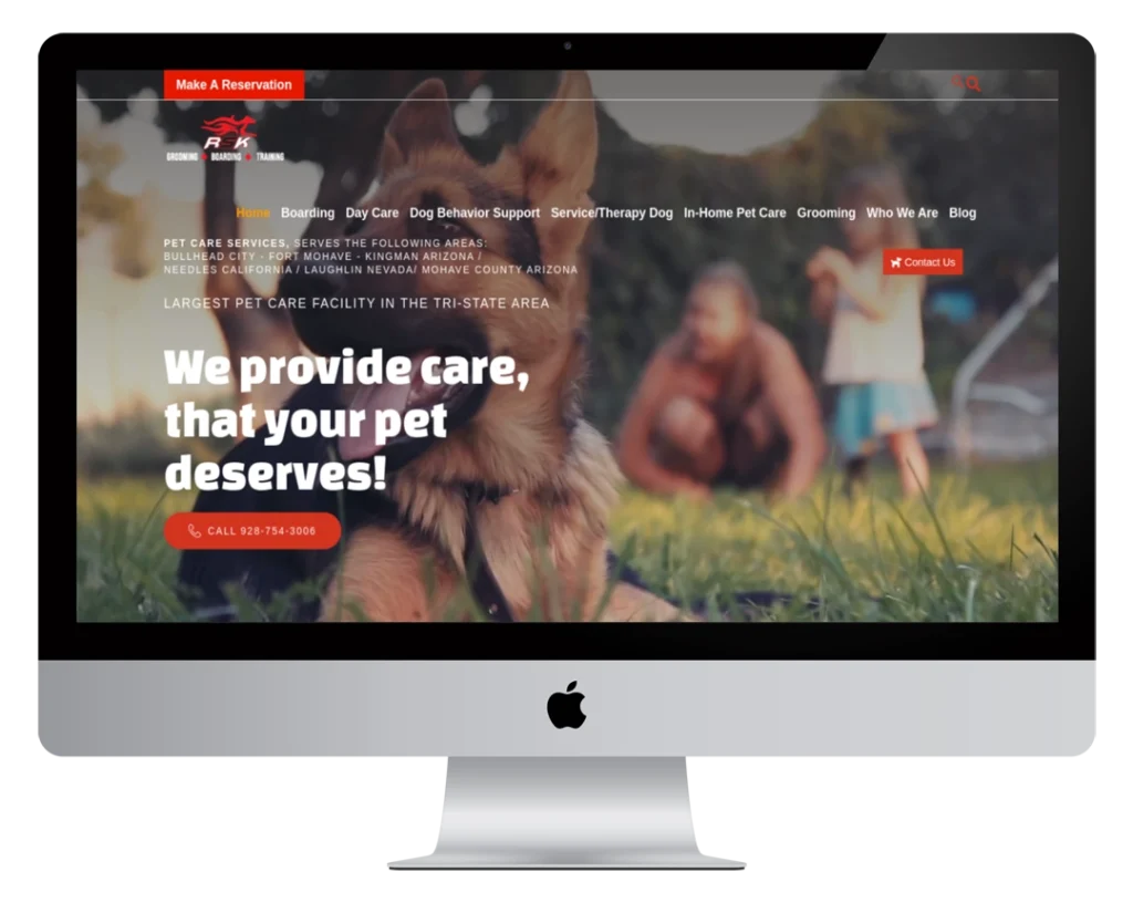 A computer monitor displays a pet care website featuring a German Shepherd dog and a child in the background. Text reads, 