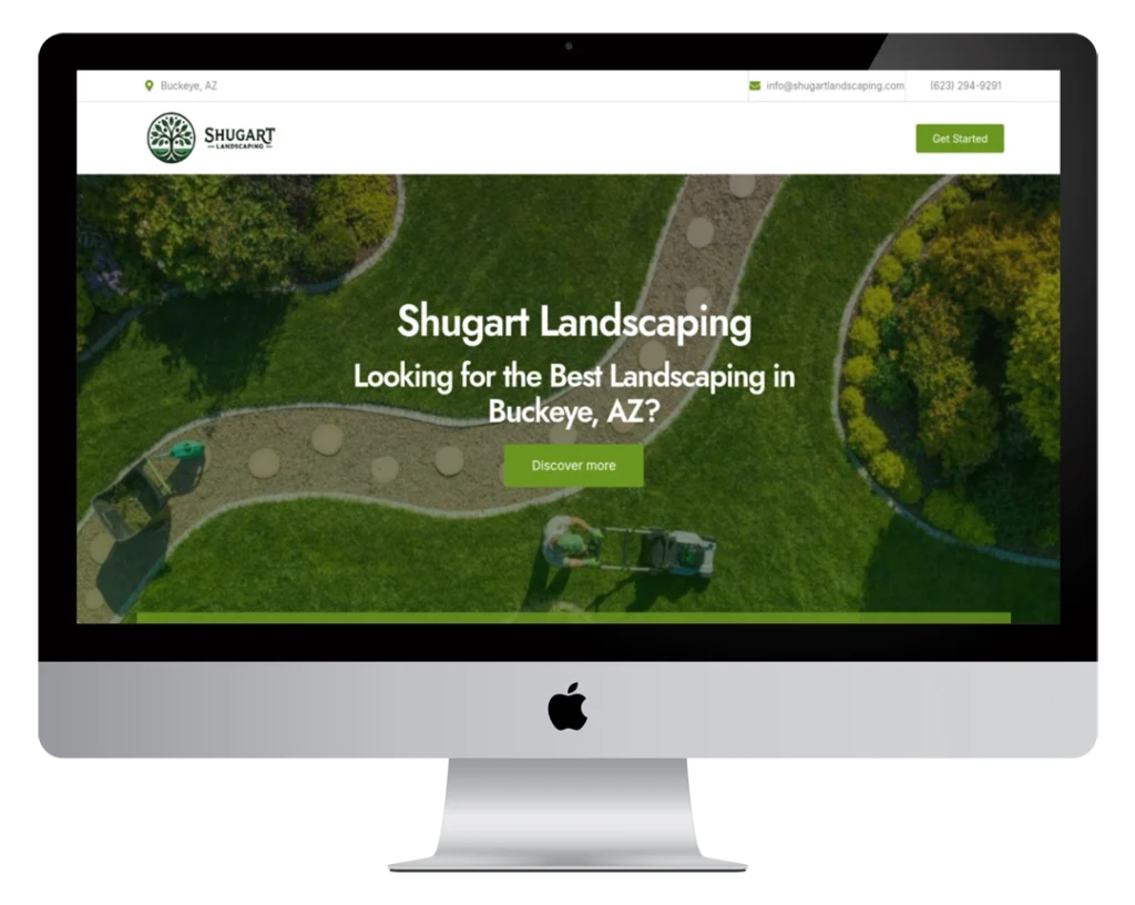 A computer screen displays the homepage of Shugart Landscaping, featuring aerial views of a lawn with a person mowing grass and text offering landscaping services in Buckeye, AZ. A green “Discover more” button is visible.