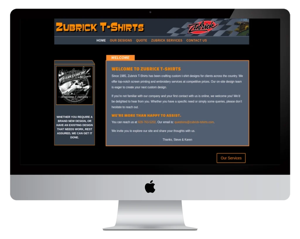 A computer monitor displays the Zubrick T-Shirts website homepage, featuring a black and yellow color scheme, navigation menu, welcome text, and a side image of a printed t-shirt design.