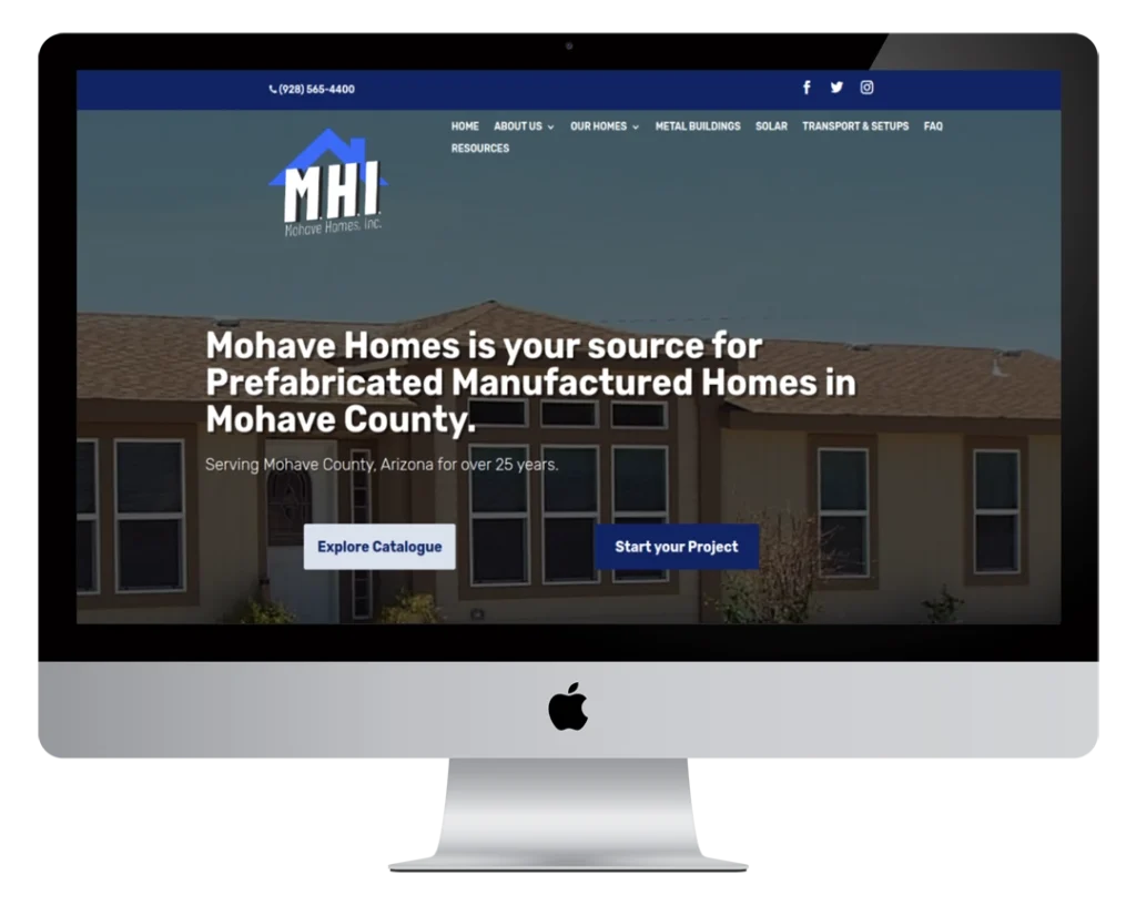 A computer monitor displays the Mohave Homes website homepage, featuring the company logo, navigation menu, and text stating they provide prefabricated manufactured homes in Mohave County, Arizona.