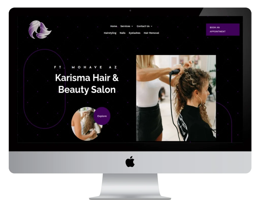 A computer screen displays the homepage of Karisma Hair & Beauty Salon, featuring a stylist curling a client’s hair, a circular logo, navigation options, and a button to book an appointment.