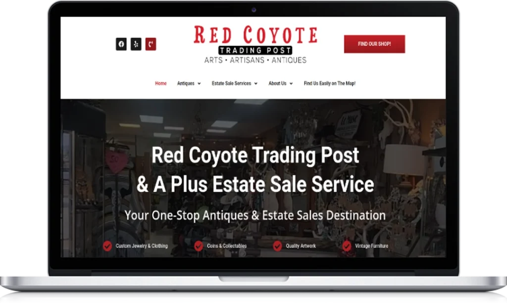 A laptop displays the Red Coyote Trading Post website homepage, featuring its name, navigation menu, and text promoting antiques and estate sale services, with a background image of an antique store interior.