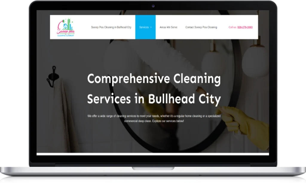 A laptop screen displays a website for “Comprehensive Cleaning Services in Bullhead City,” featuring a gloved hand cleaning a mirror and a navigation menu with contact details at the top.