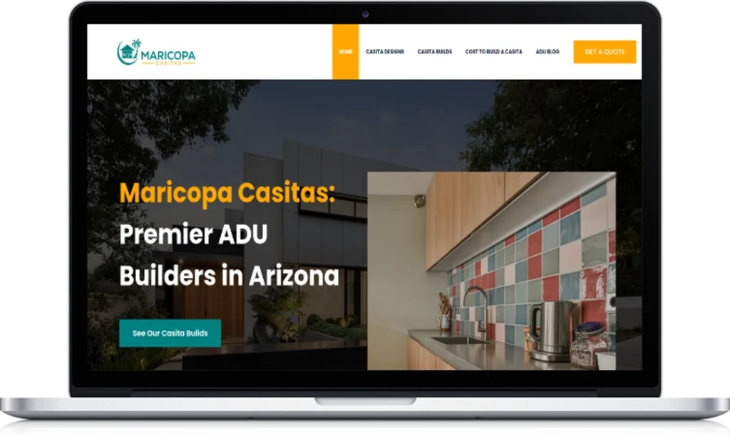 A laptop screen displays the homepage of Maricopa Casitas, advertising 