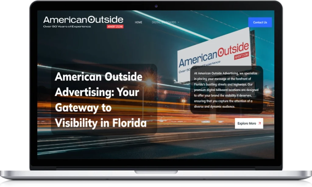 A laptop displays the homepage of American Outside Advertising, featuring a large headline about visibility in Florida, a billboard image, a brief description, and 
