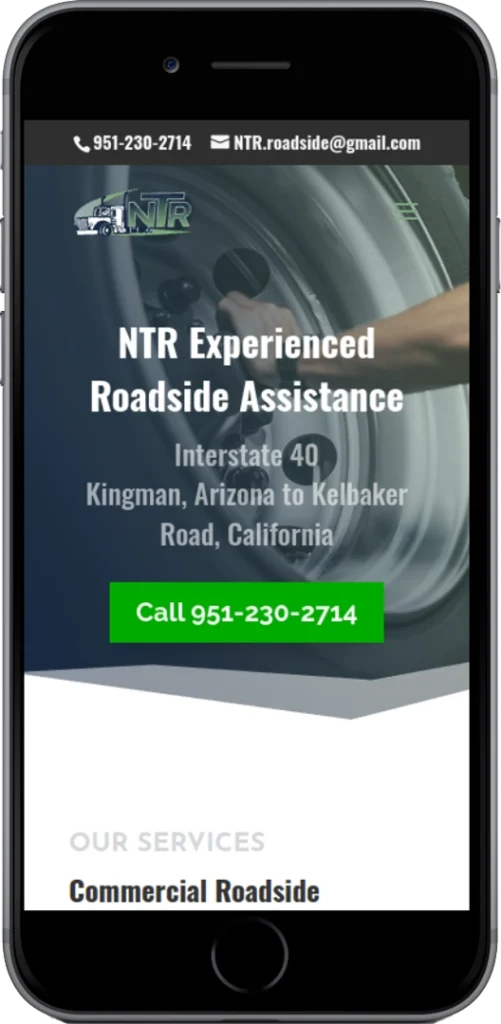 A smartphone screen displays a website for NTR Experienced Roadside Assistance, listing contact info, a green call button, and service details for Interstate 40 from Kingman, Arizona to Kelbaker Road, California.
