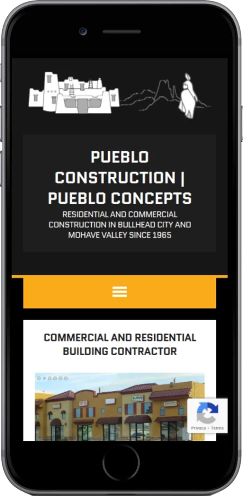 A smartphone displays a website for Pueblo Construction | Pueblo Concepts, featuring residential and commercial construction in Bullhead City and Mohave Valley since 1965, with a black, white, and yellow color scheme.