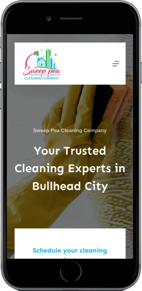 A smartphone screen displays a cleaning company website with the text “Your Trusted Cleaning Experts in Bullhead City.” A gloved hand holds a sponge cleaning a surface in the background.