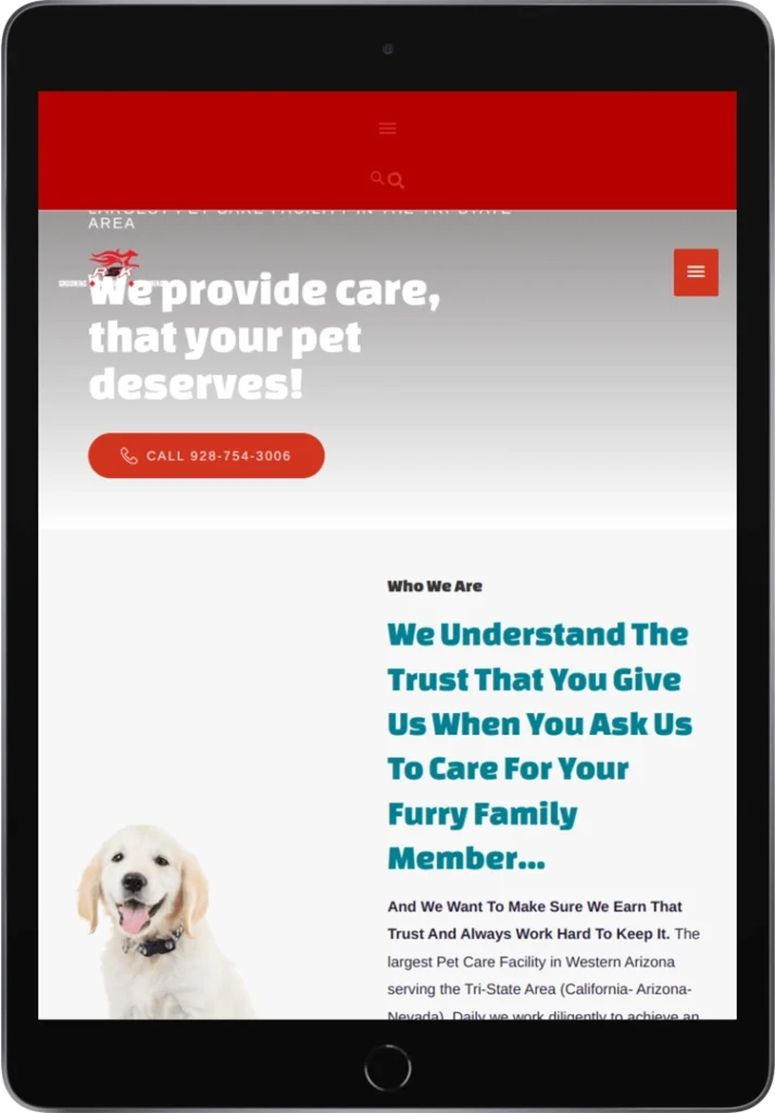 A tablet screen displays a pet care website with a red call button, headline text about providing pet care, and a section describing the facility. A photo of a smiling dog is shown in the lower part of the screen.