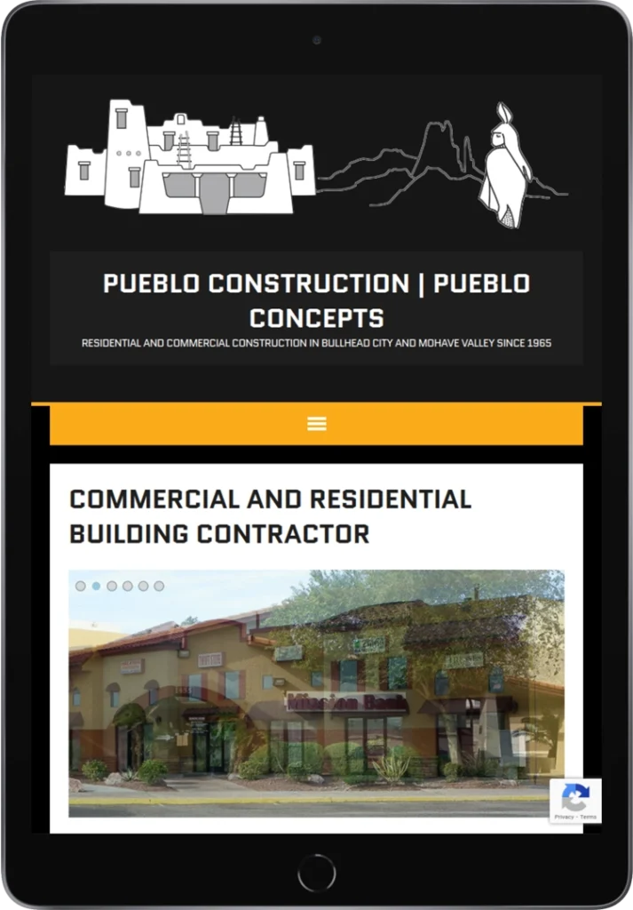 Screenshot of a tablet displaying the Pueblo Construction | Pueblo Concepts website, featuring a building illustration, company name, and a photo of a stucco-style commercial building with a verification checkbox at the bottom right.