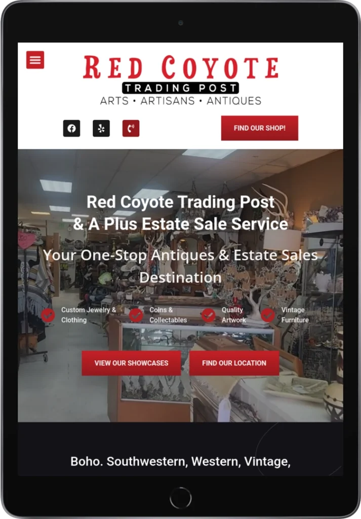A tablet displays the Red Coyote Trading Post website, featuring information about antiques and estate sales. The page shows a store interior with various items and navigation buttons for showcases and location.